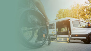 Closeup of person in wheelchair about to go into an adapted wheelchair van.