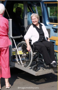 senior woman in wheelchair van