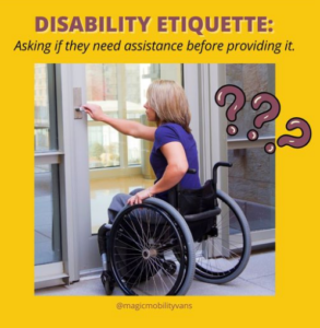 woman in wheelchair trying to open a door.