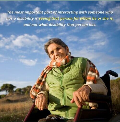 woman in wheelchair smiling